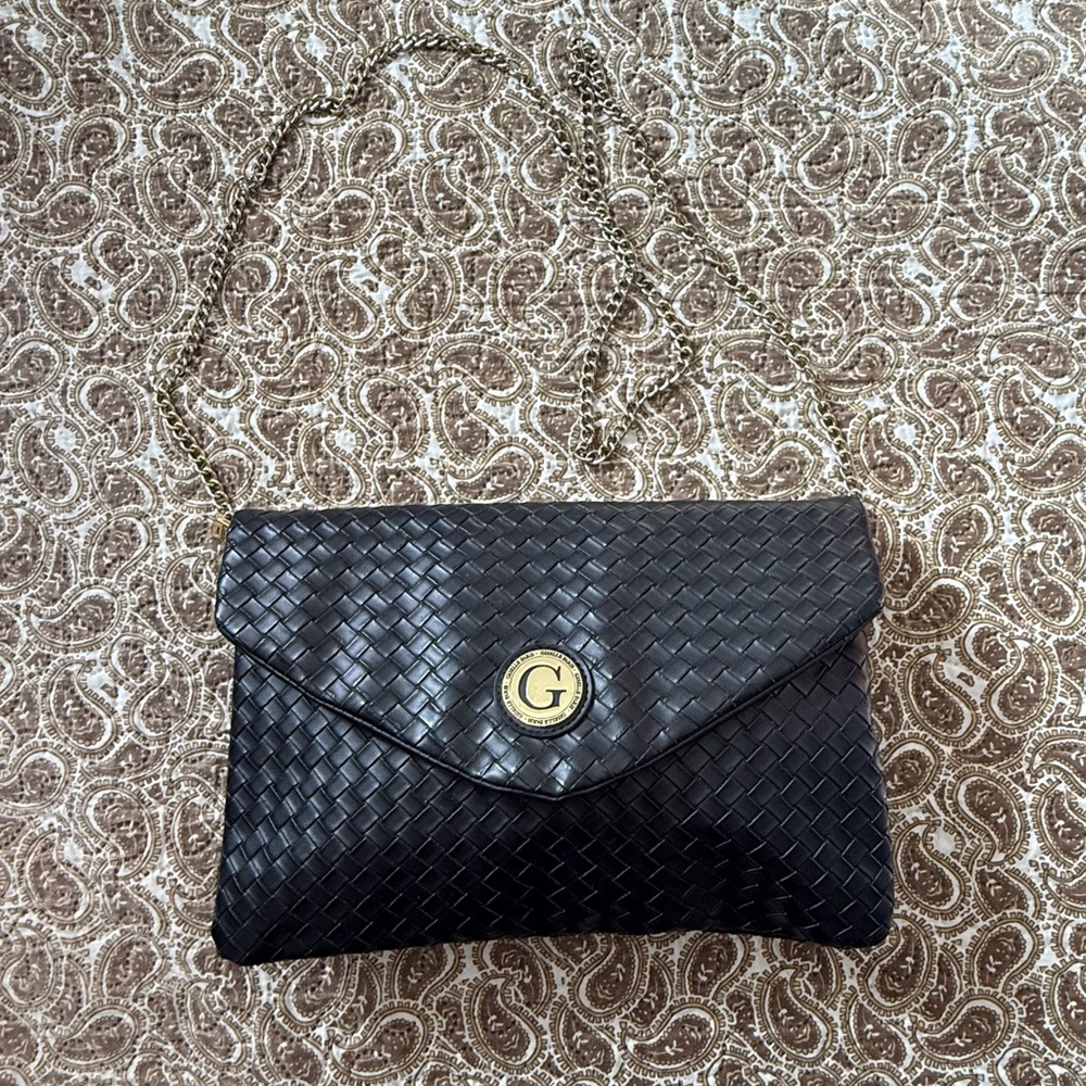 Elegant Black Woven Clutch with Gold Detail